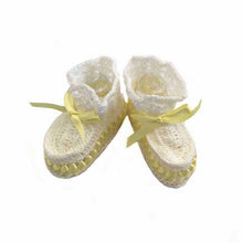 Pair of white baby booties with yellow weaved ribbons - kreassions.com