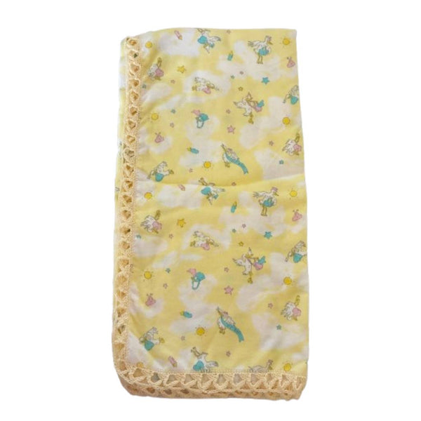 Yellow baby blanket flannel fabric with stork pattern and crocheted edges - kreassions.com
