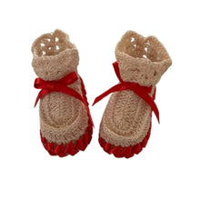 Pair of beige crochet baby booties with red ribbons  - kreassions.com