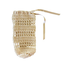 Beige baby bottlecover in crochet with a cream ribbon - kreassions.com