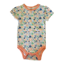 Floral-patterned baby onesie with orange trim - kreassions.com