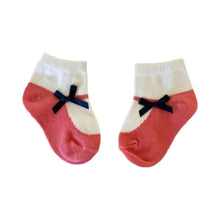 Pair of red socks with black bows - kreassions.com